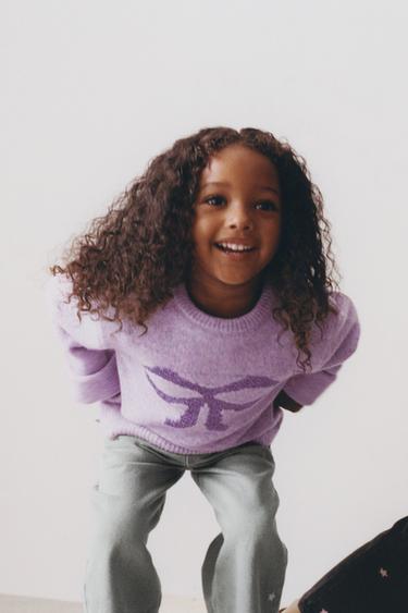 シャイニーリボン ニットセーターライトリラZaraのシャイニーリボン ニットセーター - ライトリラ 