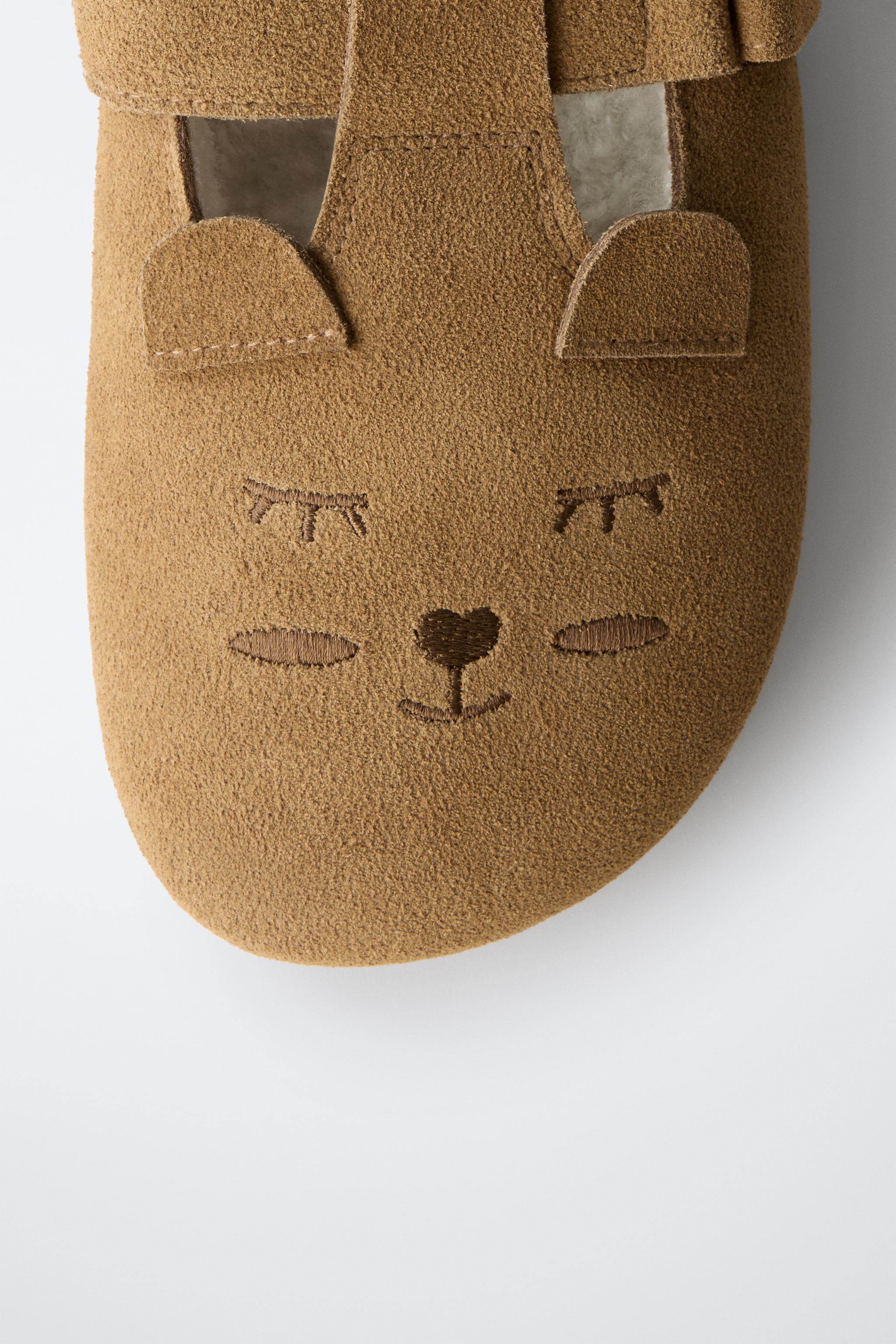 SABOTS EN CUIR IMPRIMÉ ANIMAL