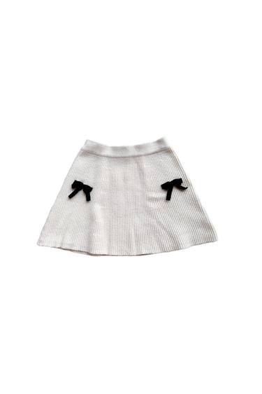 ECRU SKIRT WITH BOWS