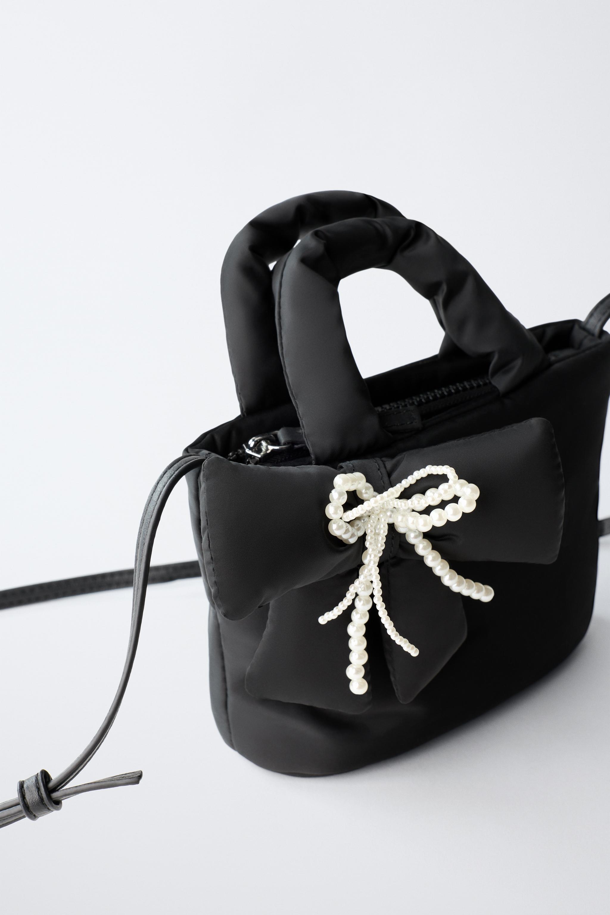 NYLONOWA TOREBKA LISTONOSZKA Z KOKARDĄ - Czarny | ZARA