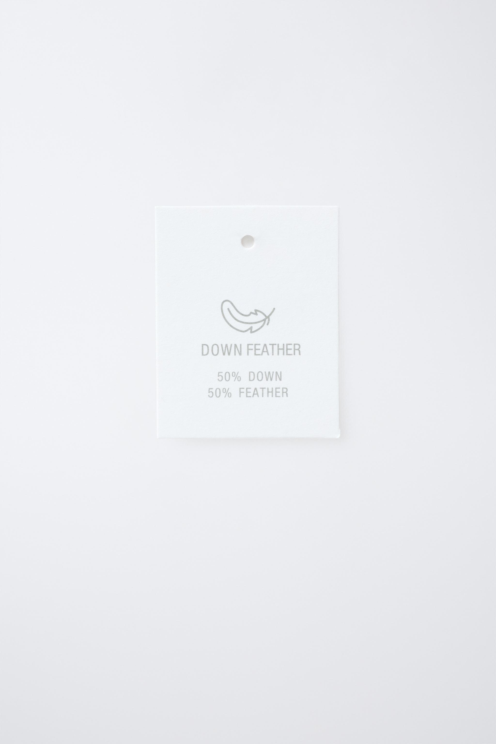 DOUDOUNE EN PLUME ET DUVET DÉPERLANTE AVEC CAPUCHE EFFET FOURRURE AMOVIBLE