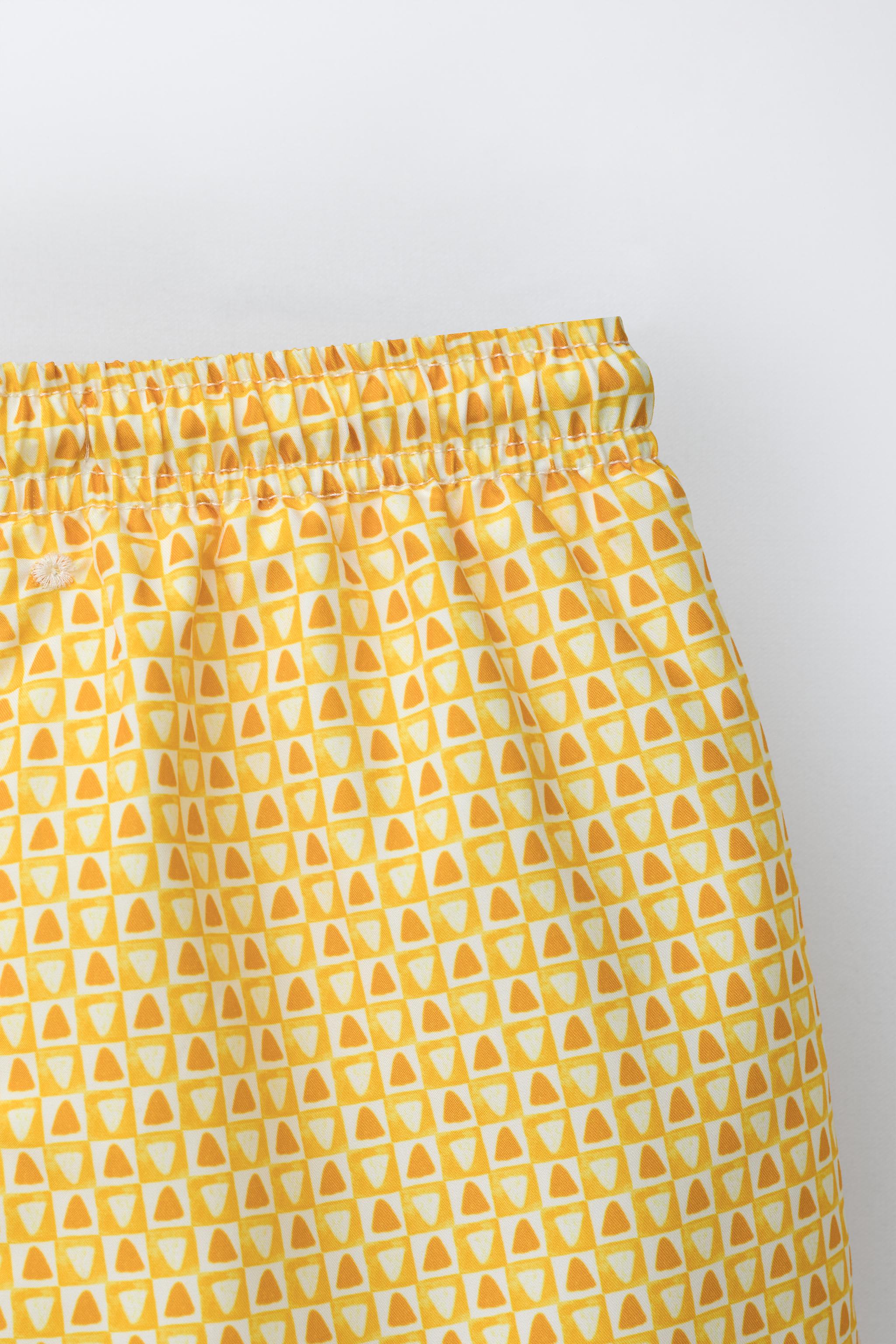 AGES 6-14 / GEOMETRIC PRINT SWIM SHORTS