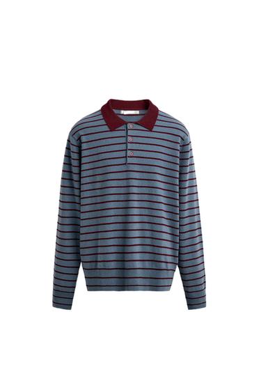 Front view of a striped, washed blue polo shirt, burgundy lapel collar, front button placket, long sleeves, ribbed trims.