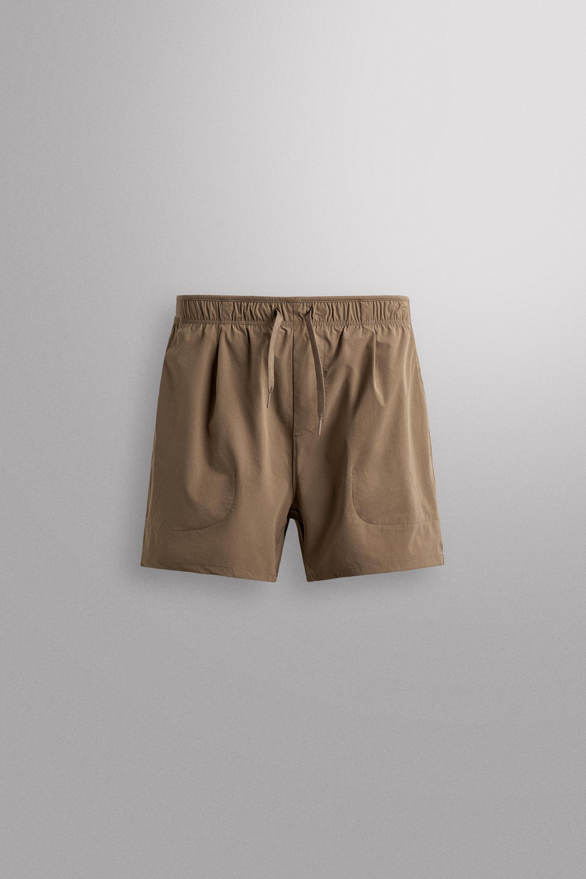 7" TECHNICAL TRAINING SHORTS — Light brown