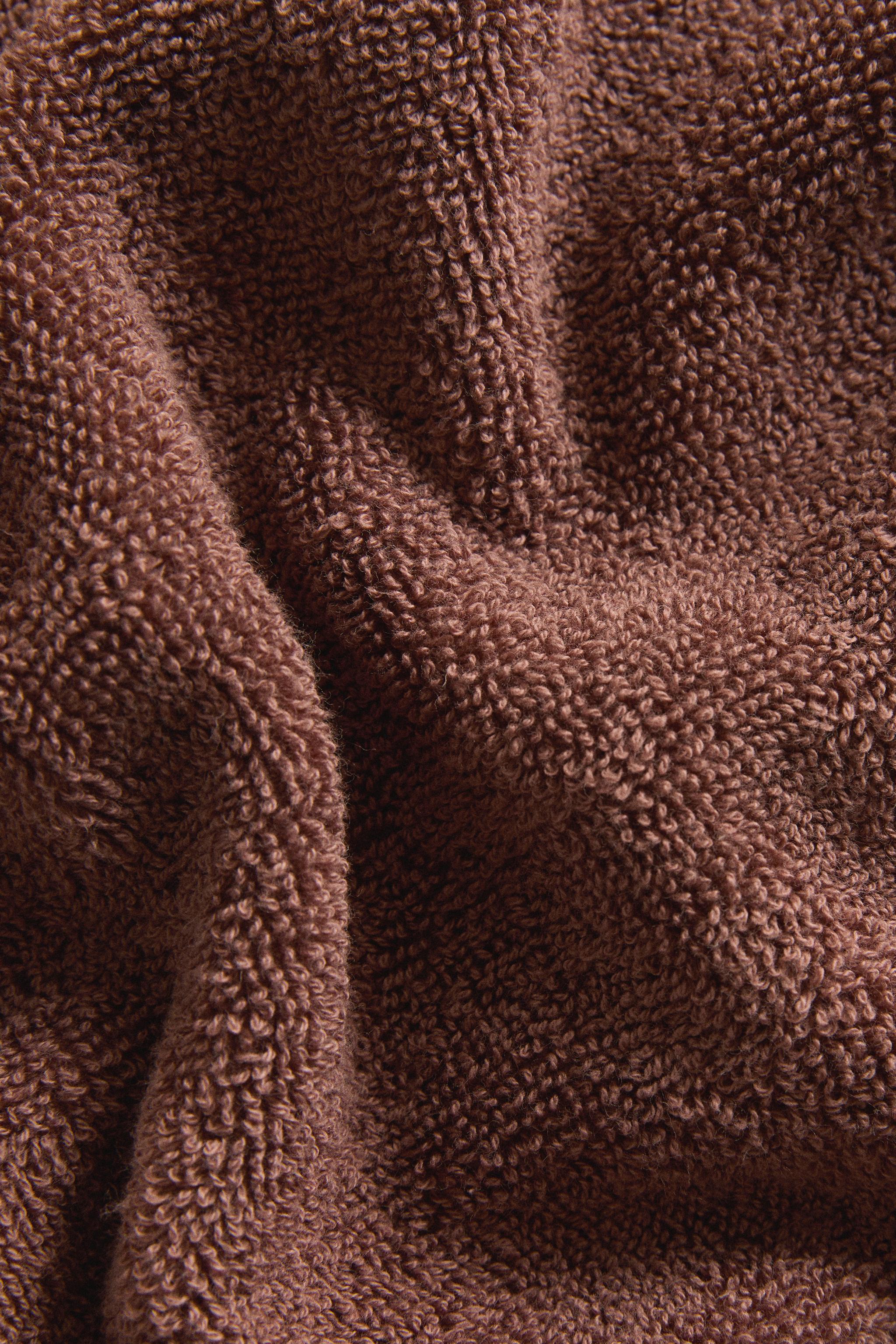 COTTON OVERLOCK BATH TOWEL