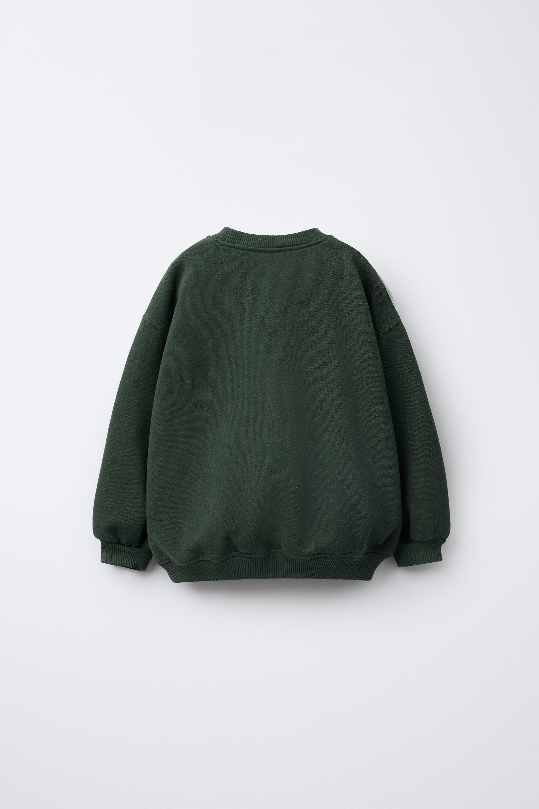 FAUX SHEARLING BEAR PATCH SWEATSHIRT