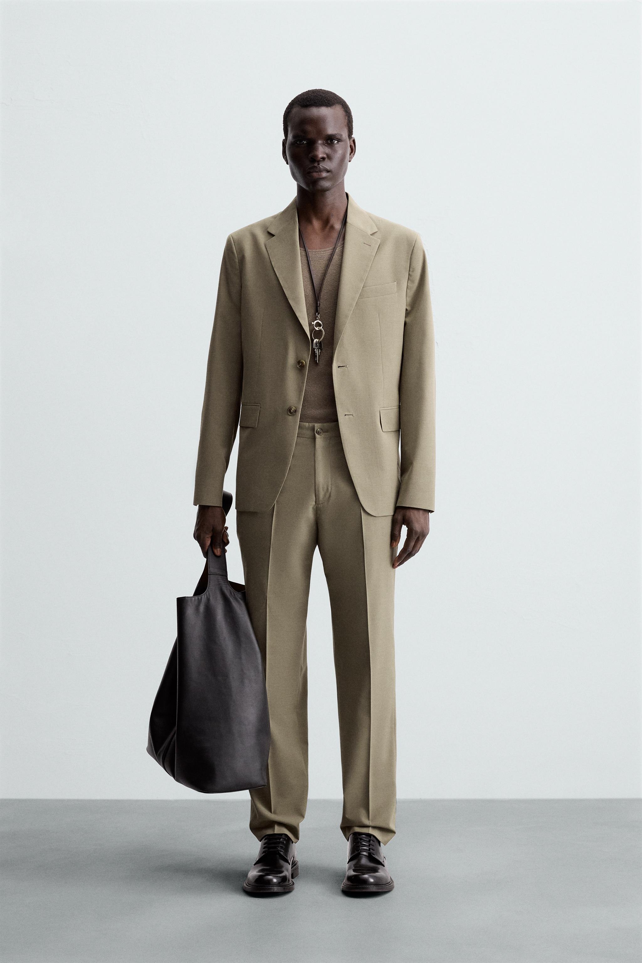 TEXTURED SUIT PANTS