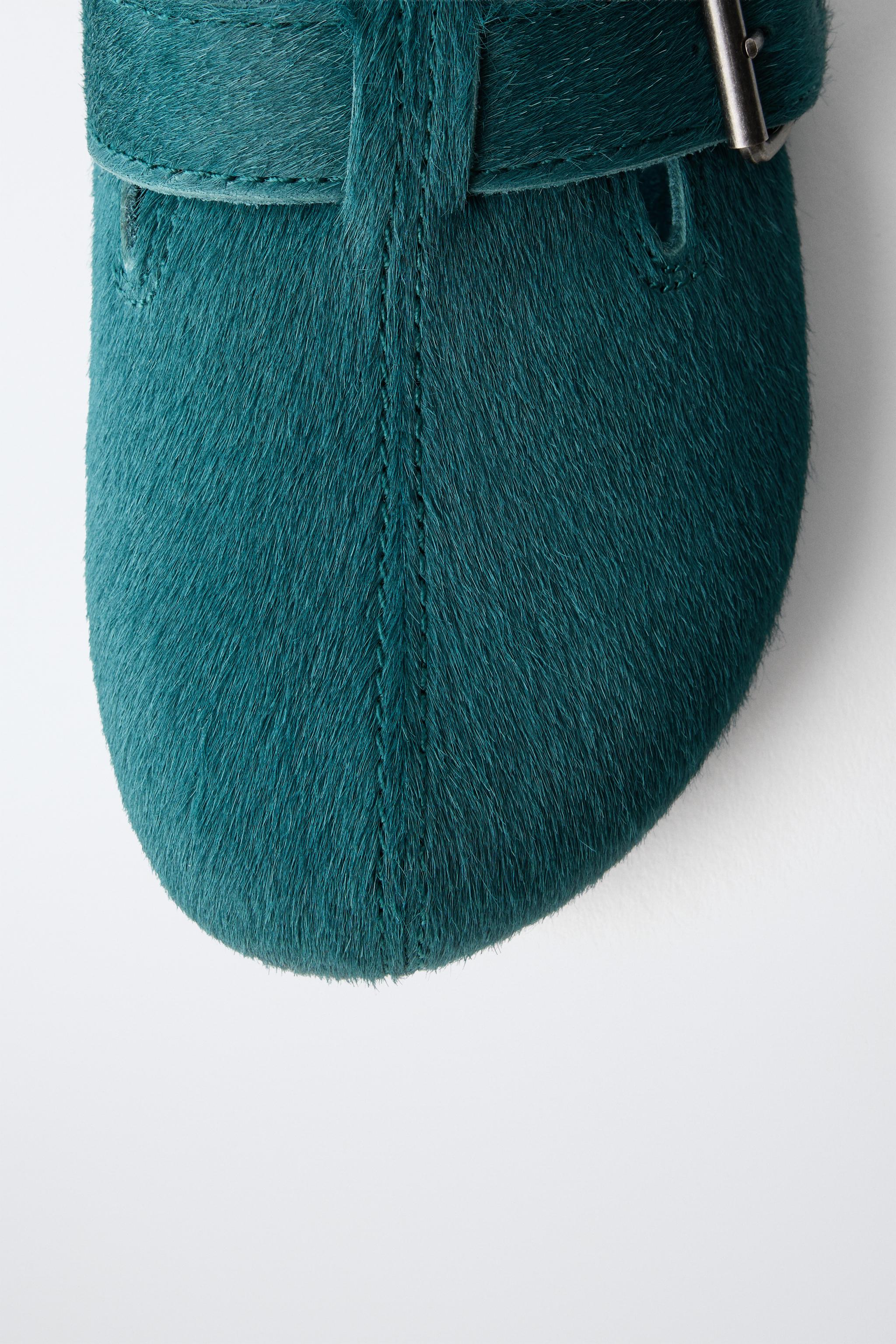 SABOTS EN CUIR À BOUCLE
