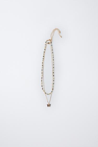 PACK OF TWO NECKLACES WITH BUTTERFLY BEADS - Golden by Zara