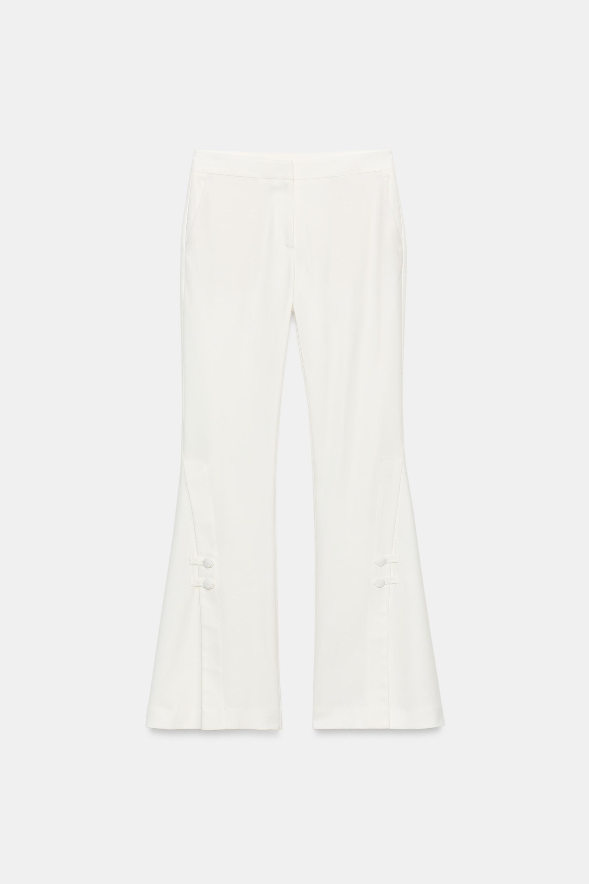 PANTS WITH SLIT HEMS