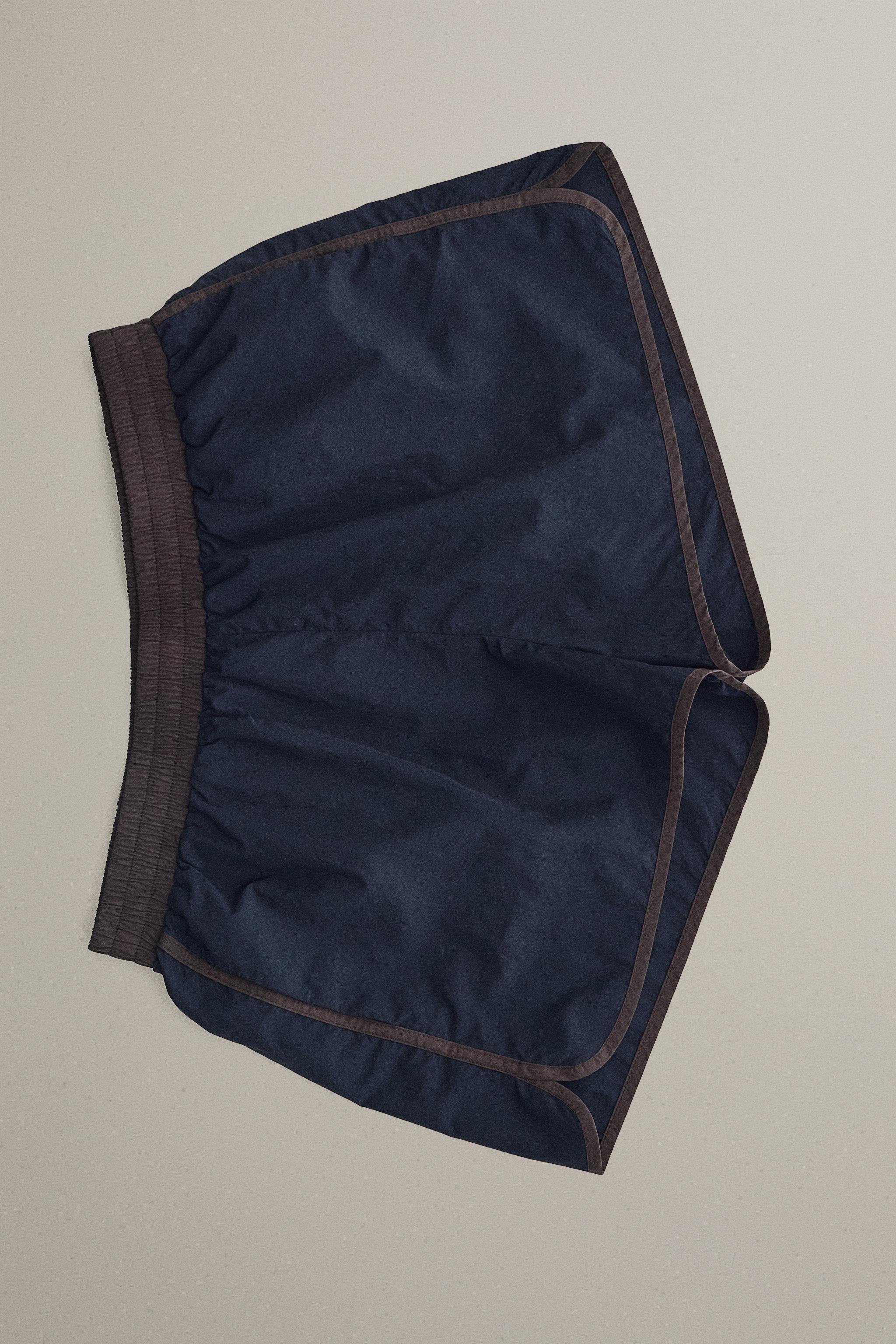 SHORTS WITH CONTRAST TRIM