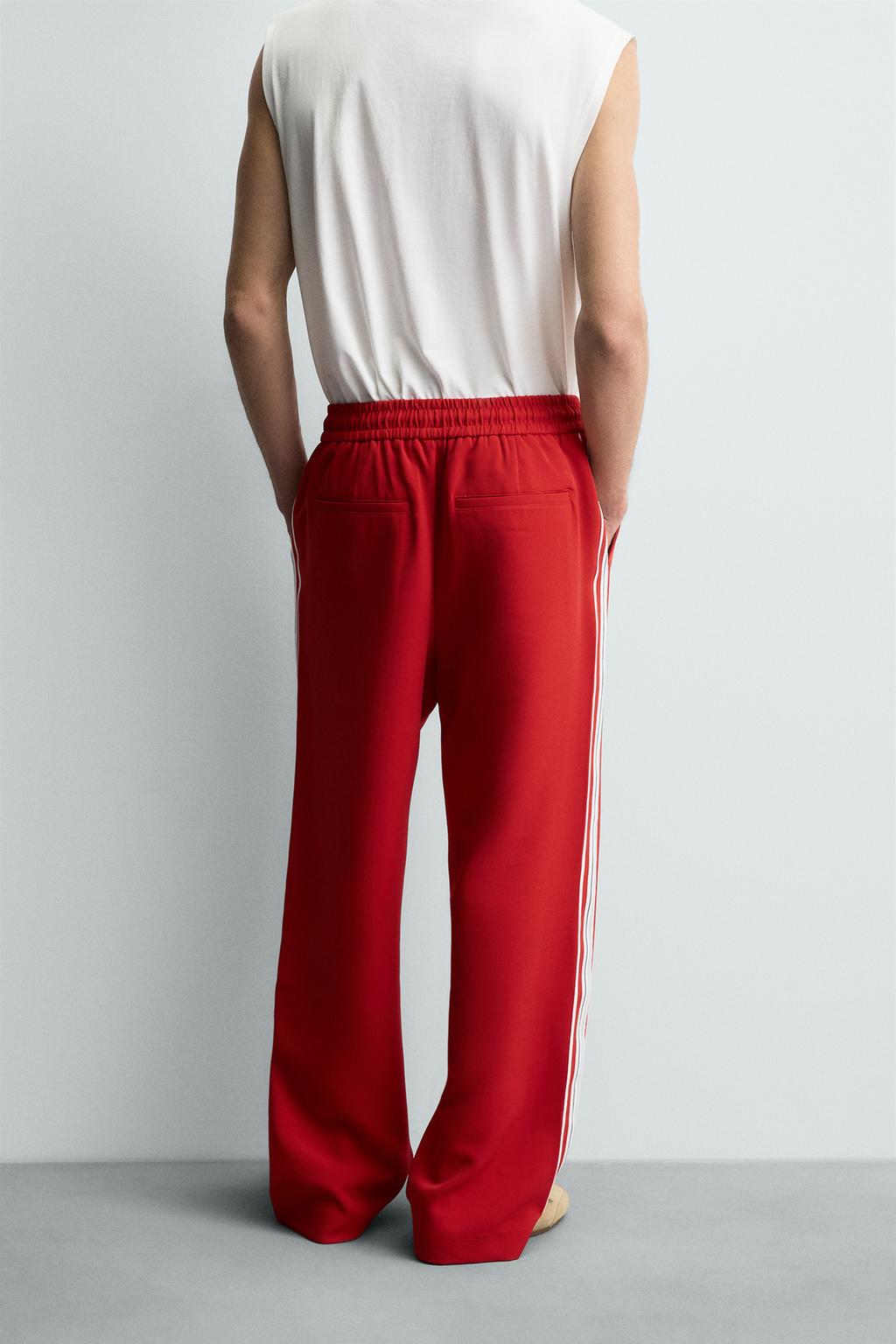 WIDE FIT JOGGER PANTS WITH SIDE STRIPES