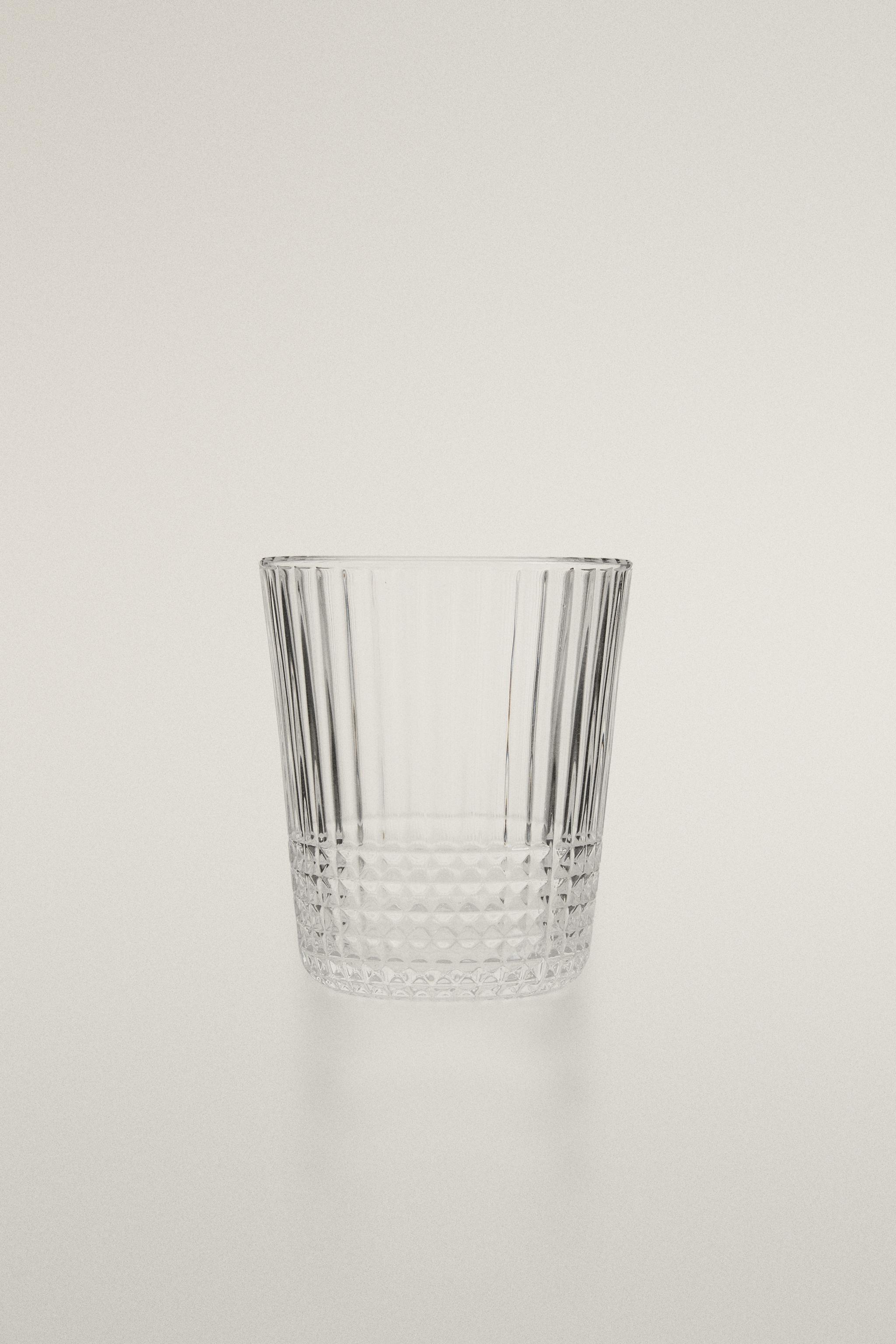 GLASS TUMBLER WITH RAISED GEOMETRIC DESIGN — Transparent