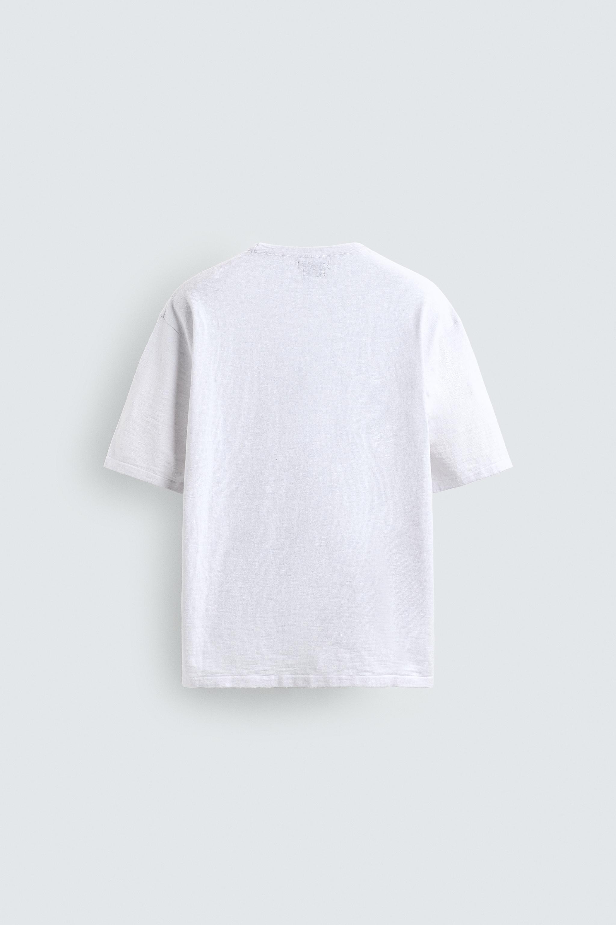 T-SHIRT EN MAILLE STRUCTURÉE FLAMMÉE