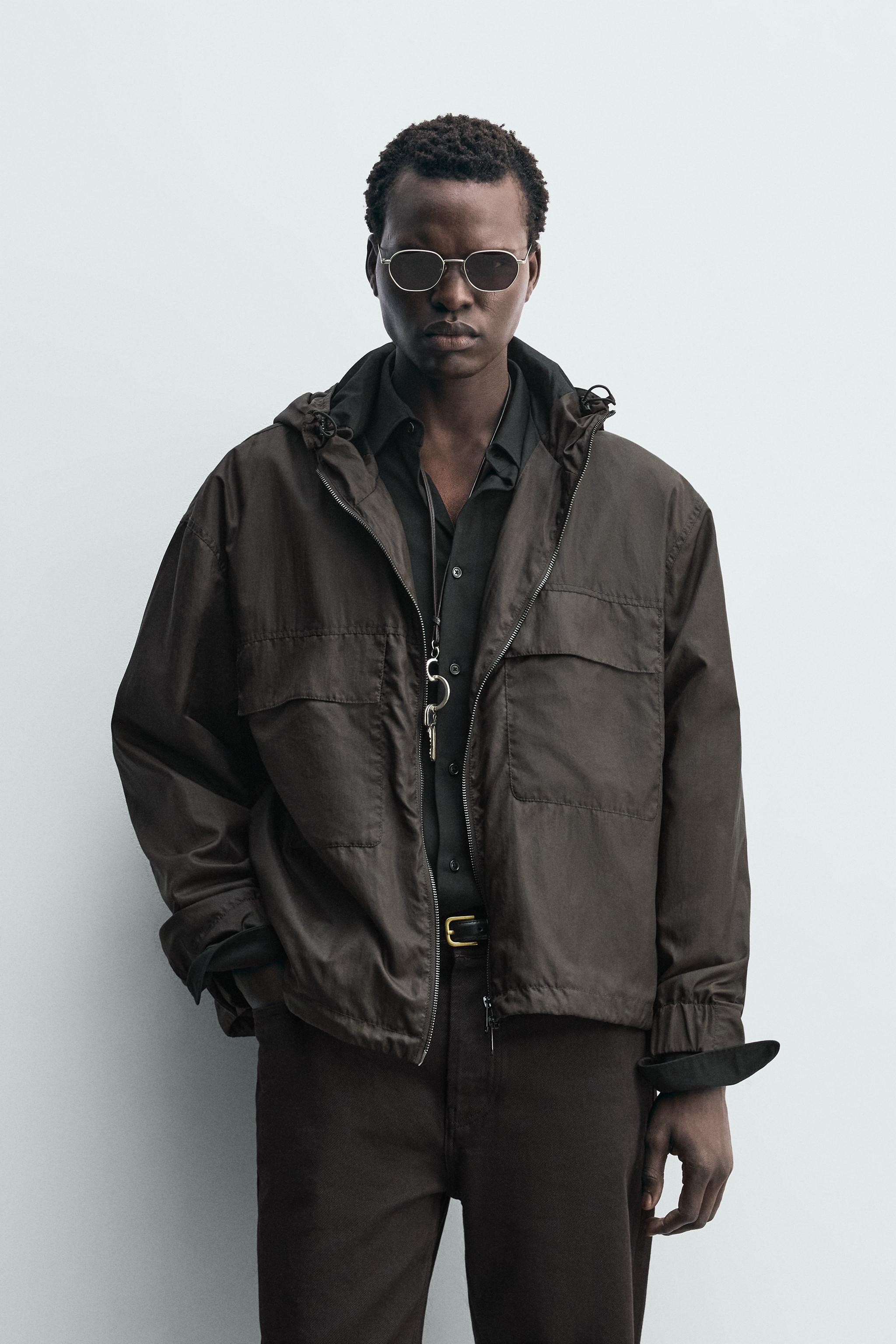 BLOUSON TECHNIQUE À CAPUCHE