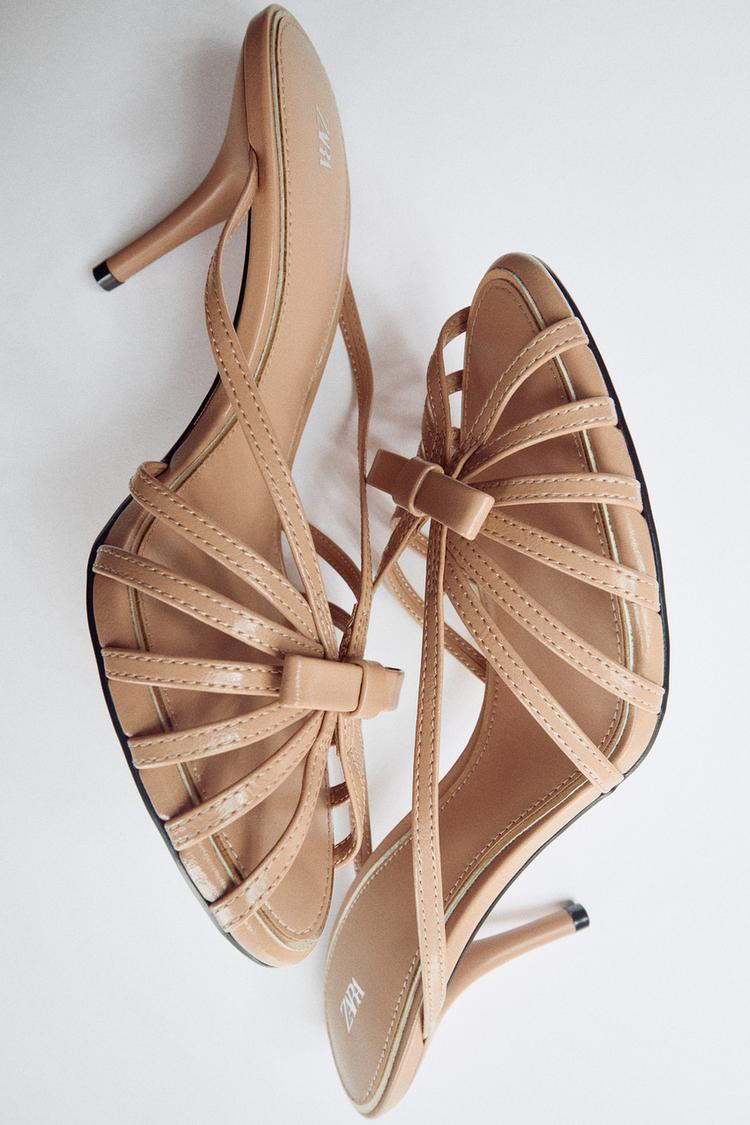 SUEDE BOW-DETAIL CAGE SANDALS — Beige