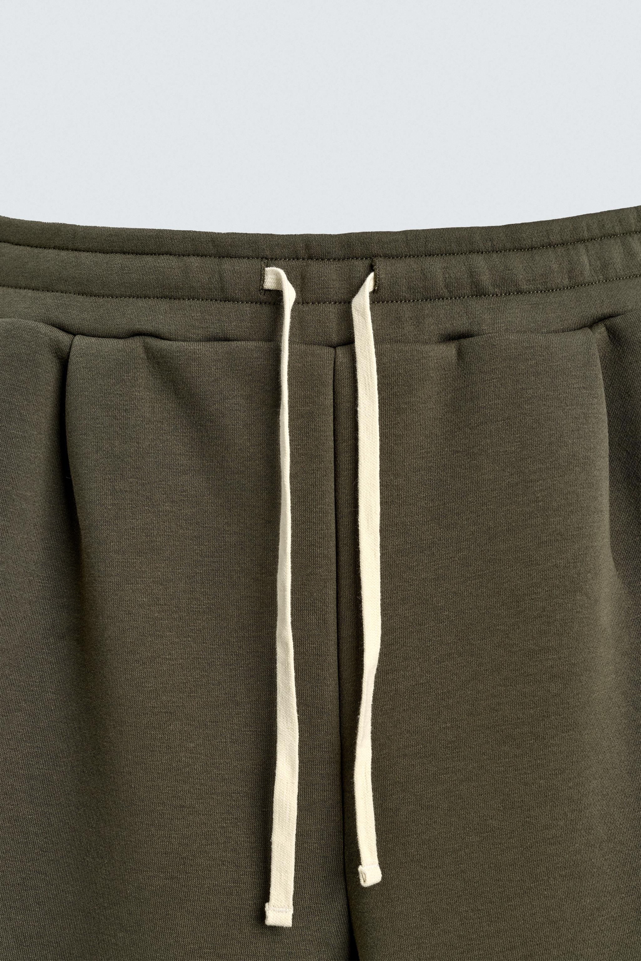 PANTALON WIDE FIT EFFET NÉOPRÈNE CLOUS