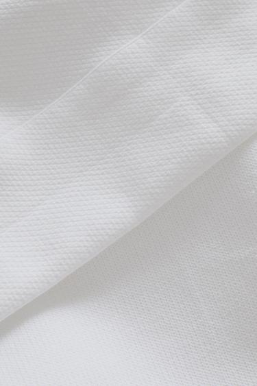 GERUITE BEDSPREI MET SIERRAND - Wit van Zara