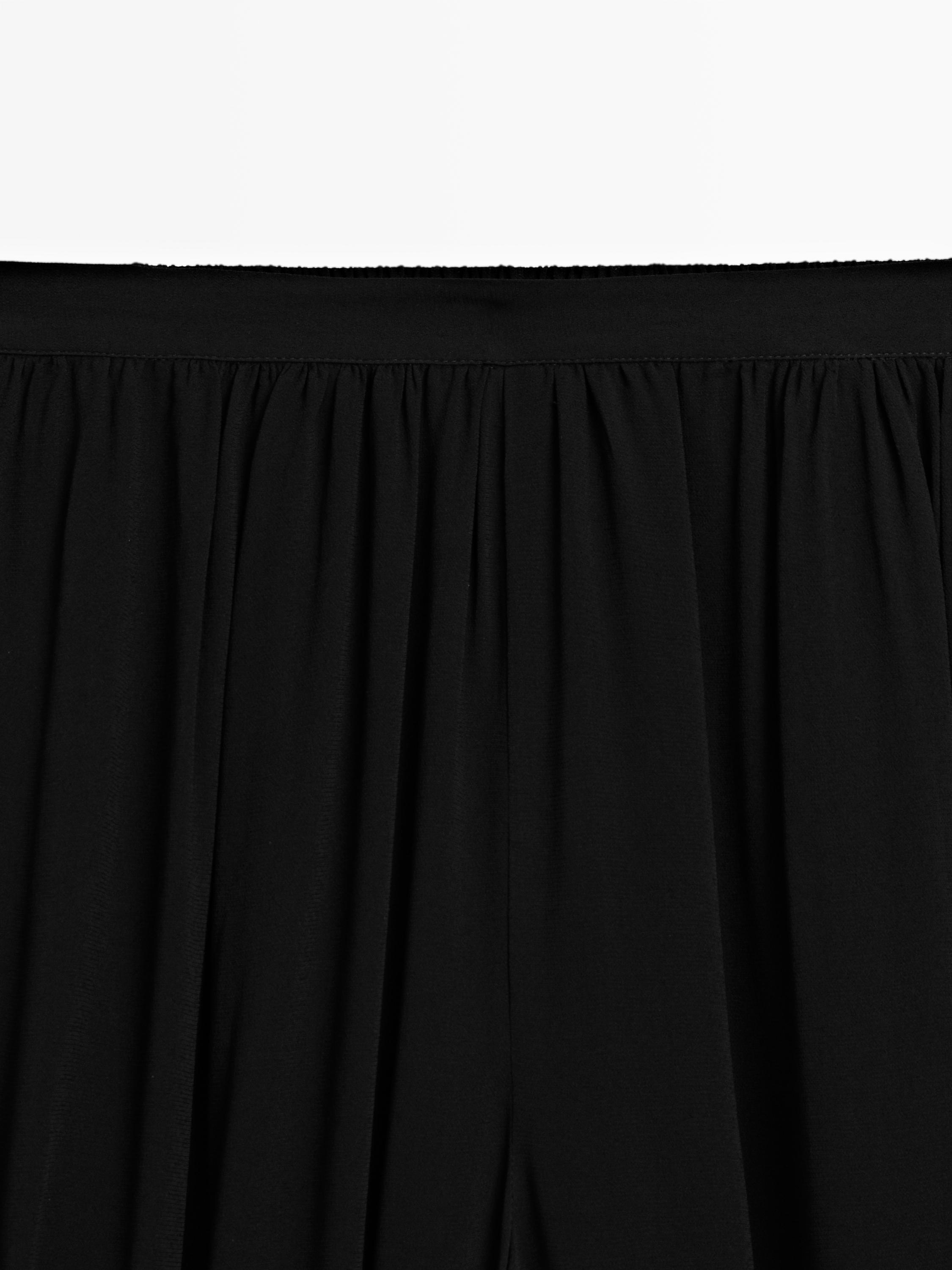 Sarouel trousers with button details