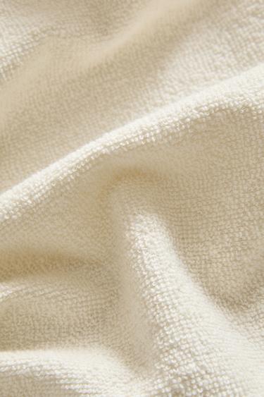 منشفة شاطئ قطن بشراشيب - عاج الخاص بـ Zara