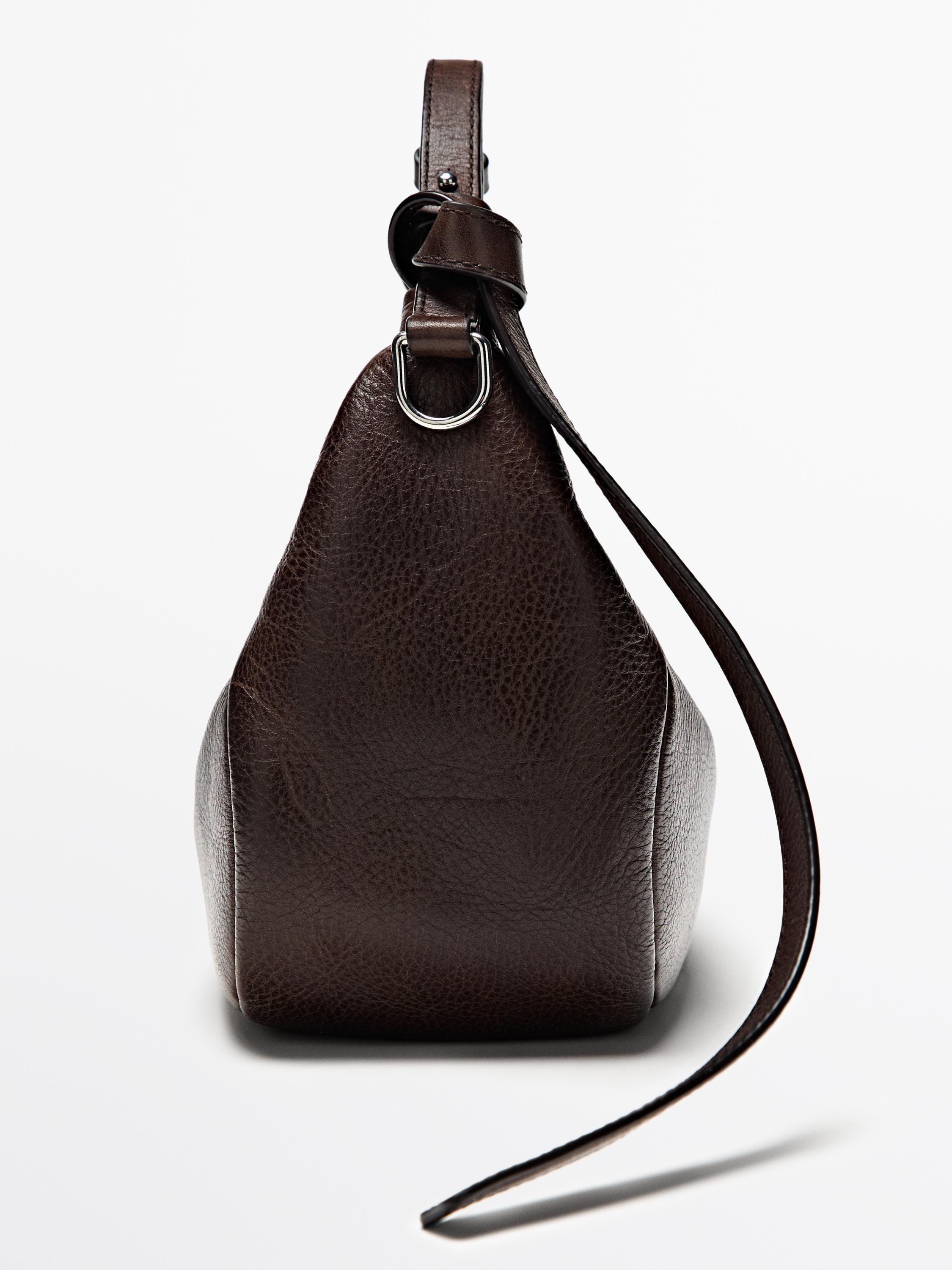 Nappa leather bag with metal buckle