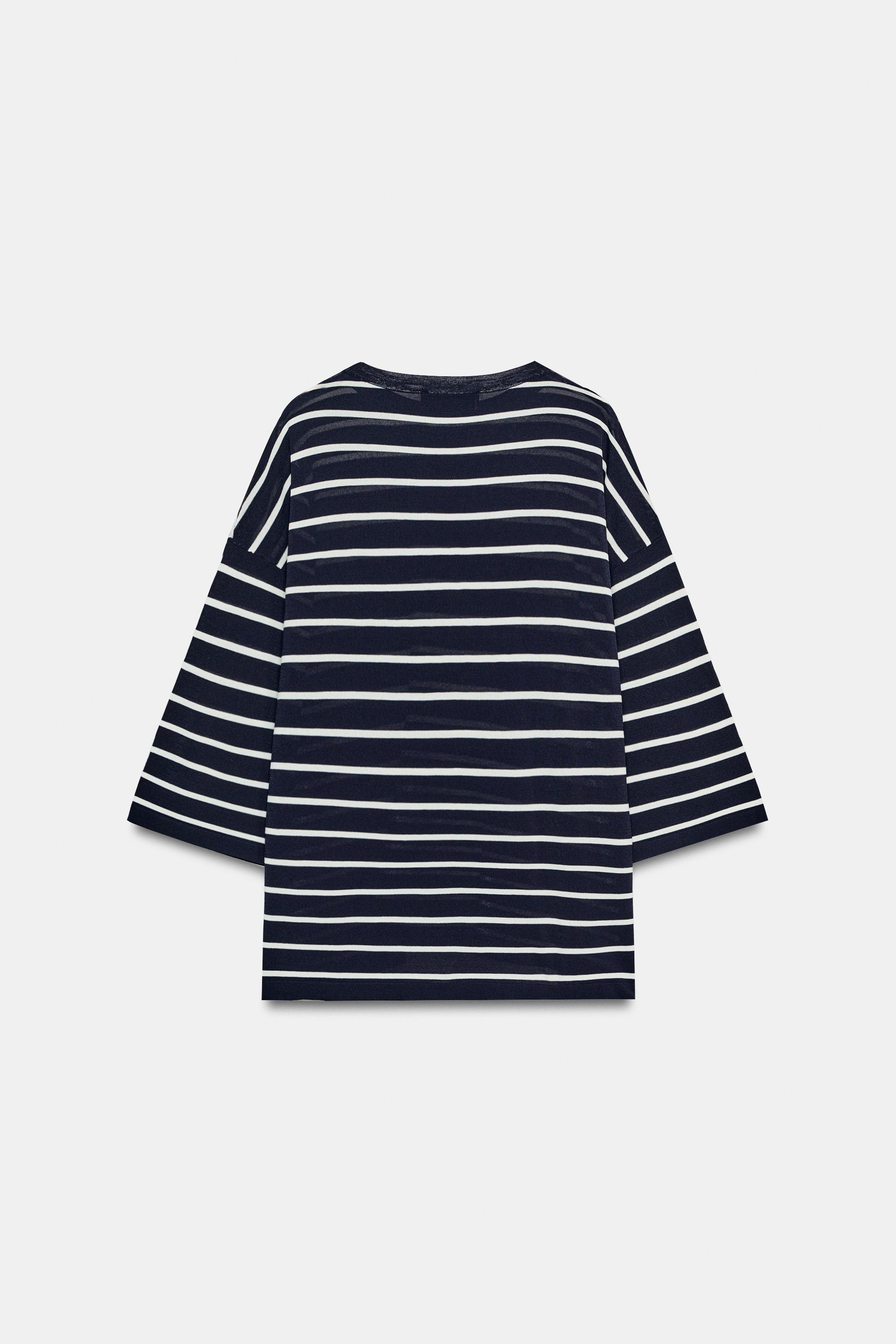 THREE-QUARTER SLEEVE KNIT TOP