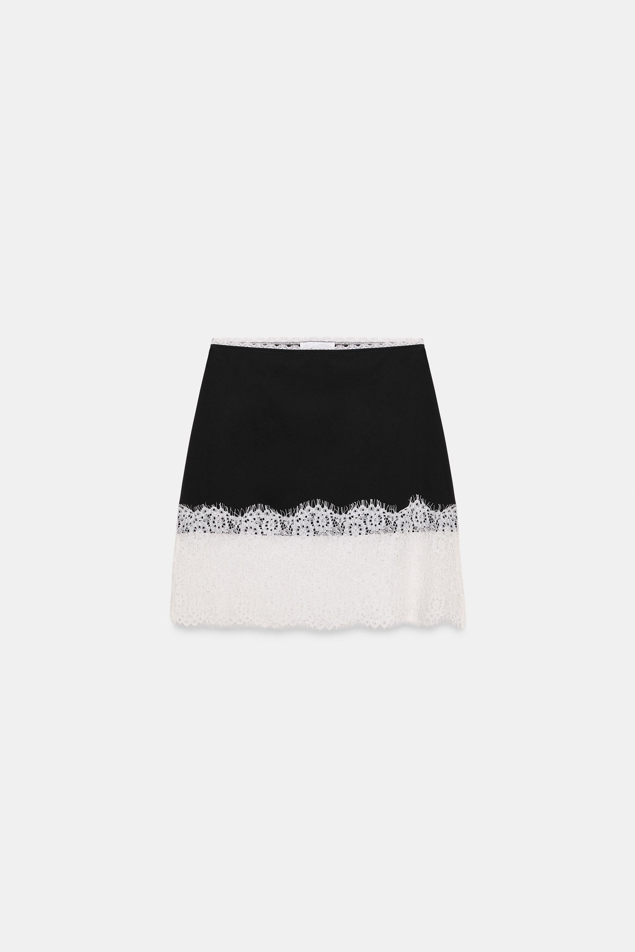 MINI-JUPE BIMATIÈRE EN DENTELLE