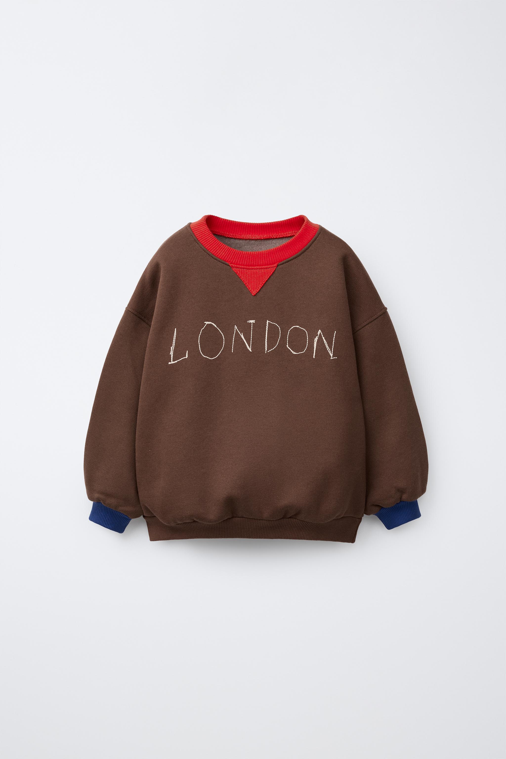SUDADERA TEXTO BORDADO