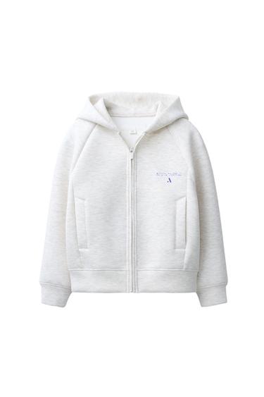 ŠPORTNI PULOVER IZ NEOPRENA Z ZADRGO - Lisasto siva od Zare