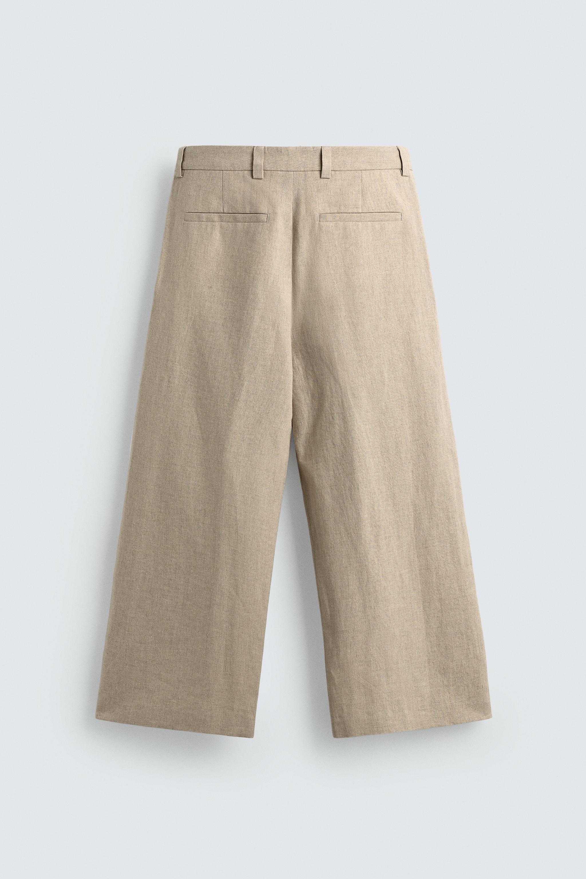 RELAXED FIT PLEATED SUIT PANTS