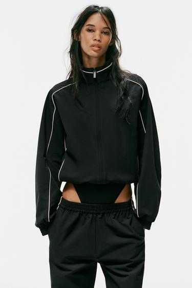 CHAQUETA TÉCNICA VIVOS CONTRASTE - Negro de Zara