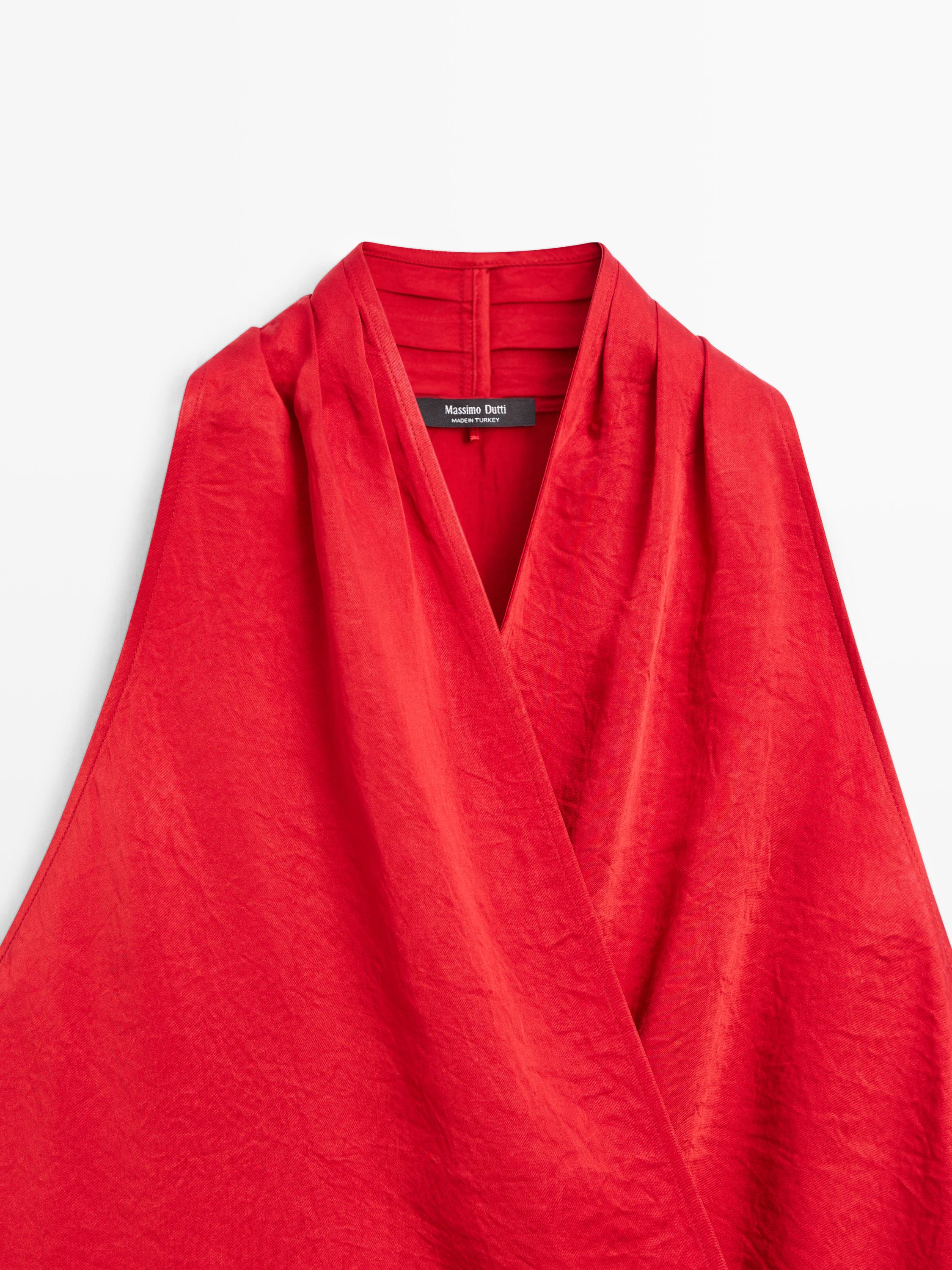 Flowing wrap top