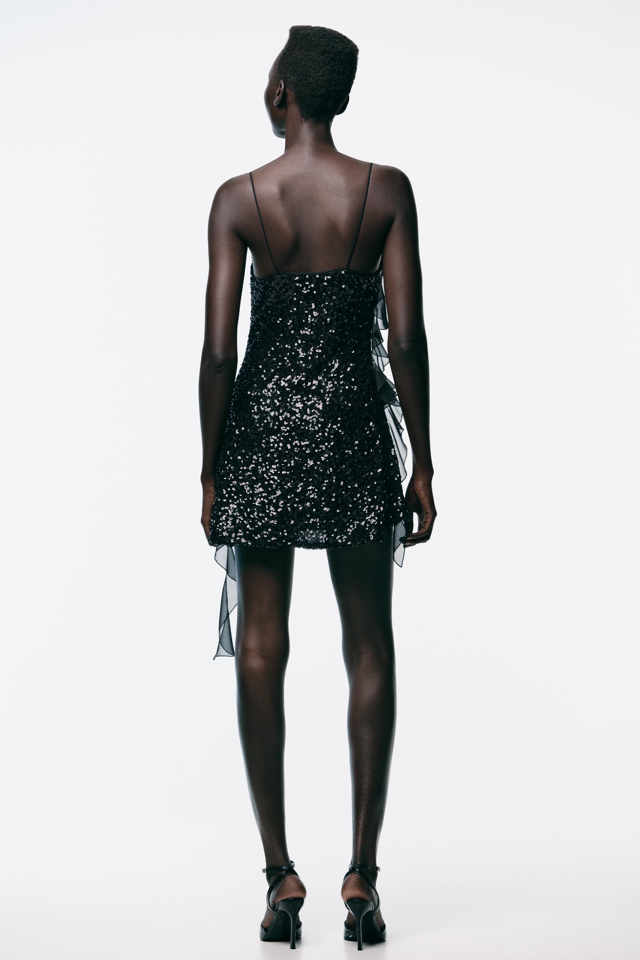zara black sequin dress Zara sparkle season: black midi dress you can't really see in this video but it has raised sequin flowers all over the dress! #zaraoutfit #zaratryon Zara sequin dress, Zara black holiday