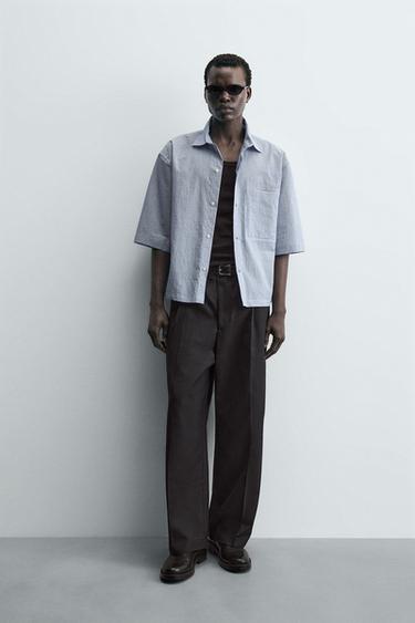 PANTALÓN RELAXED FIT PLIEGUES - Negro de Zara - Imagen 0