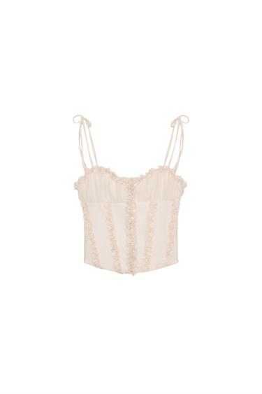 TOP TIPUS COTILLA AMB VOLANTS - Crema de Zara