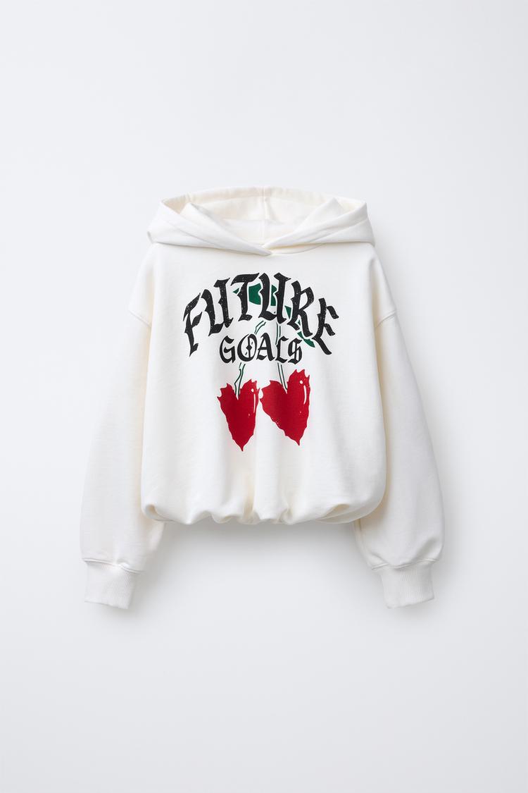 SUDADERA GLOBO CAPUCHA ESTAMPADA - Blanco roto de Zara - Imagen 1