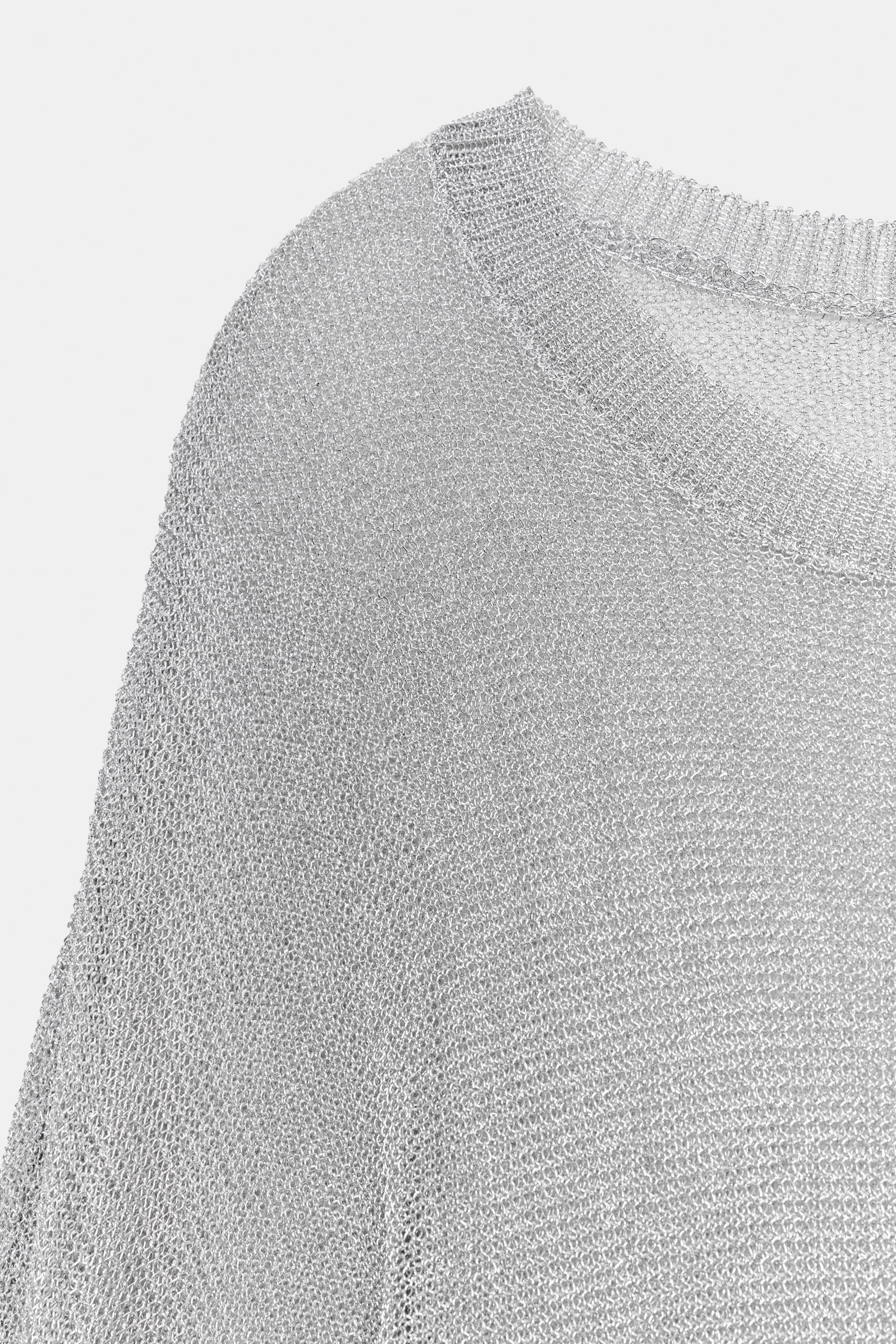 PULL EN MAILLE AVEC FIL MÉTALLISÉ