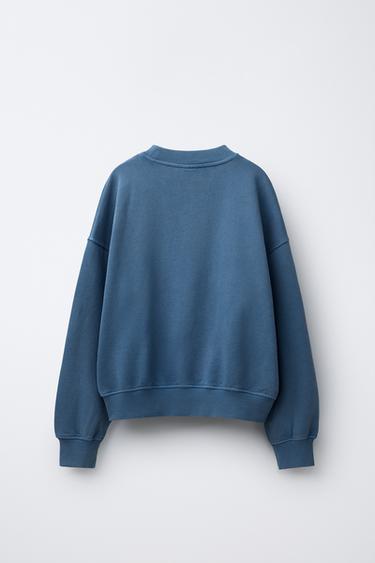 SWEATSHIRT IN VERWASCHENER OPTIK MIT STERNNIETEN - Mittelblau von Zara
