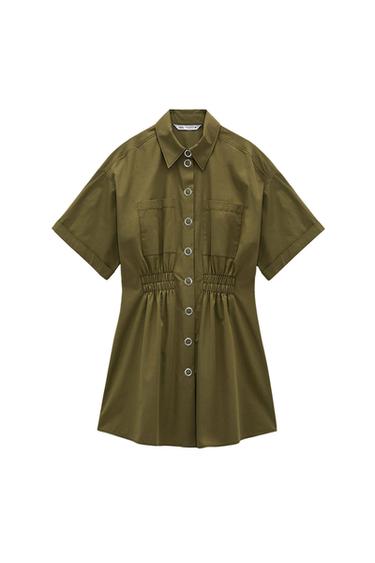 Olive green short-sleeved shirt dress. ZARA label. Lapel collar, button-up front, pockets and elasticated waist.