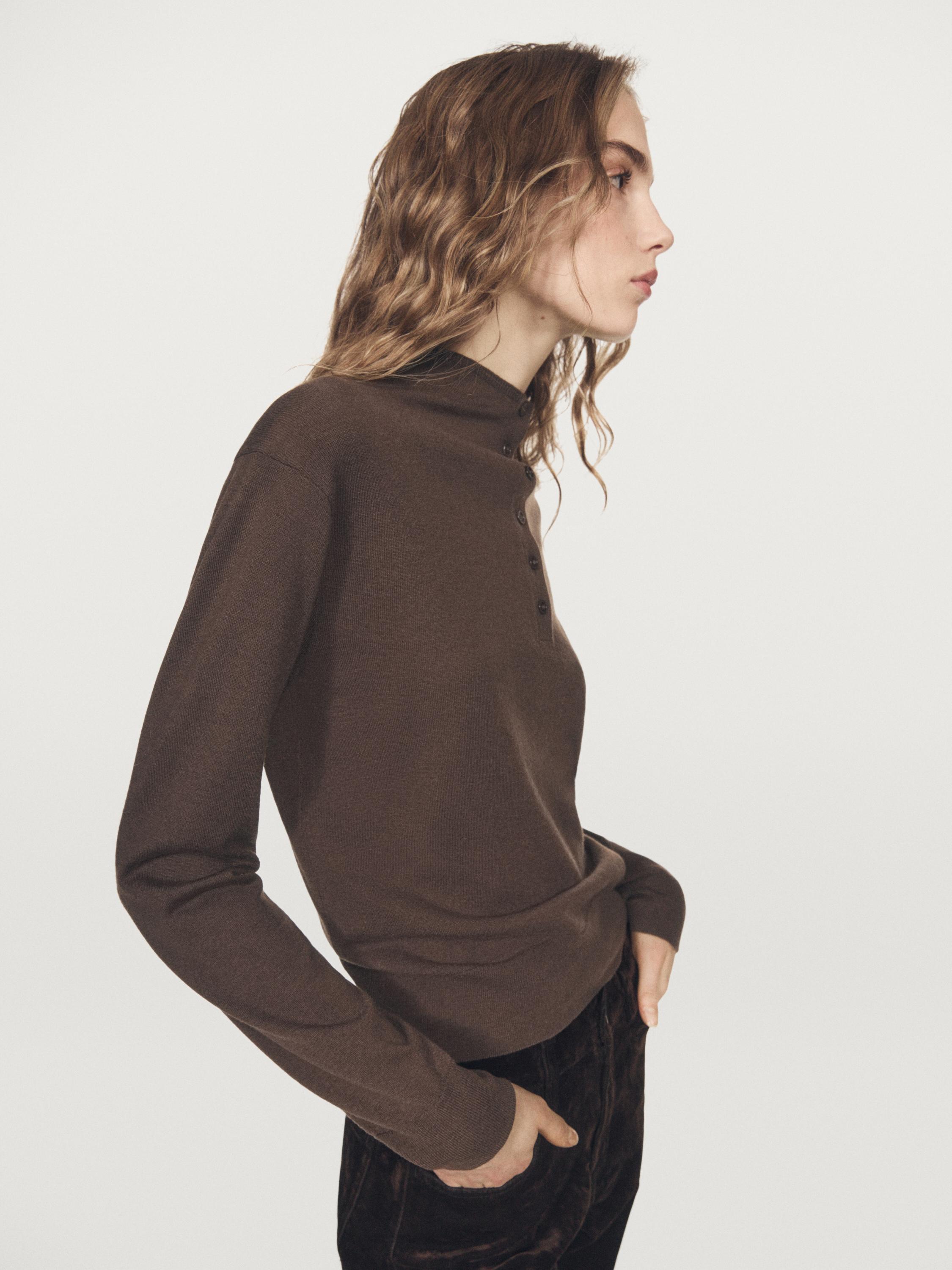 Mock turtleneck button-up sweater