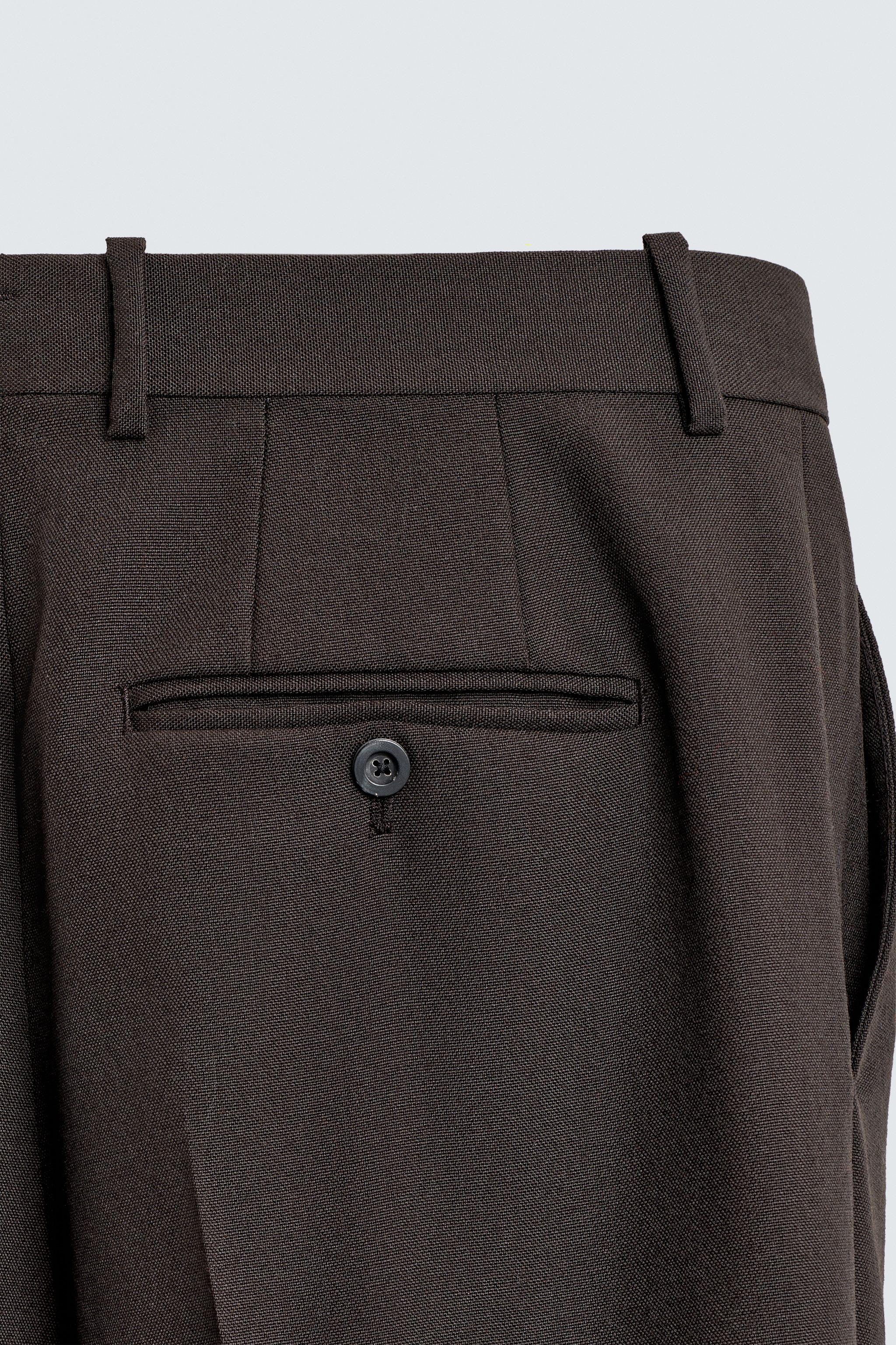 100% WOOL PLEATED PANTS