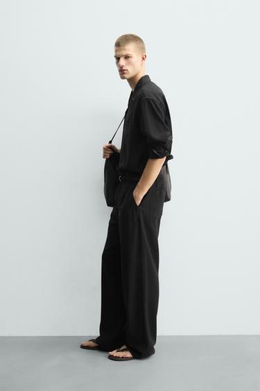 RELAXED FIT FLOWING TROUSERS - Black by Zara