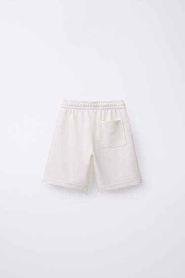 BERMUDA RUSTIQUE SLIM FIT EFFET ÉPONGE - Écru de Zara - Image 1