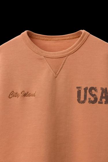 CAMISETA INTERLOCK TEXTO - Naranja de Zara