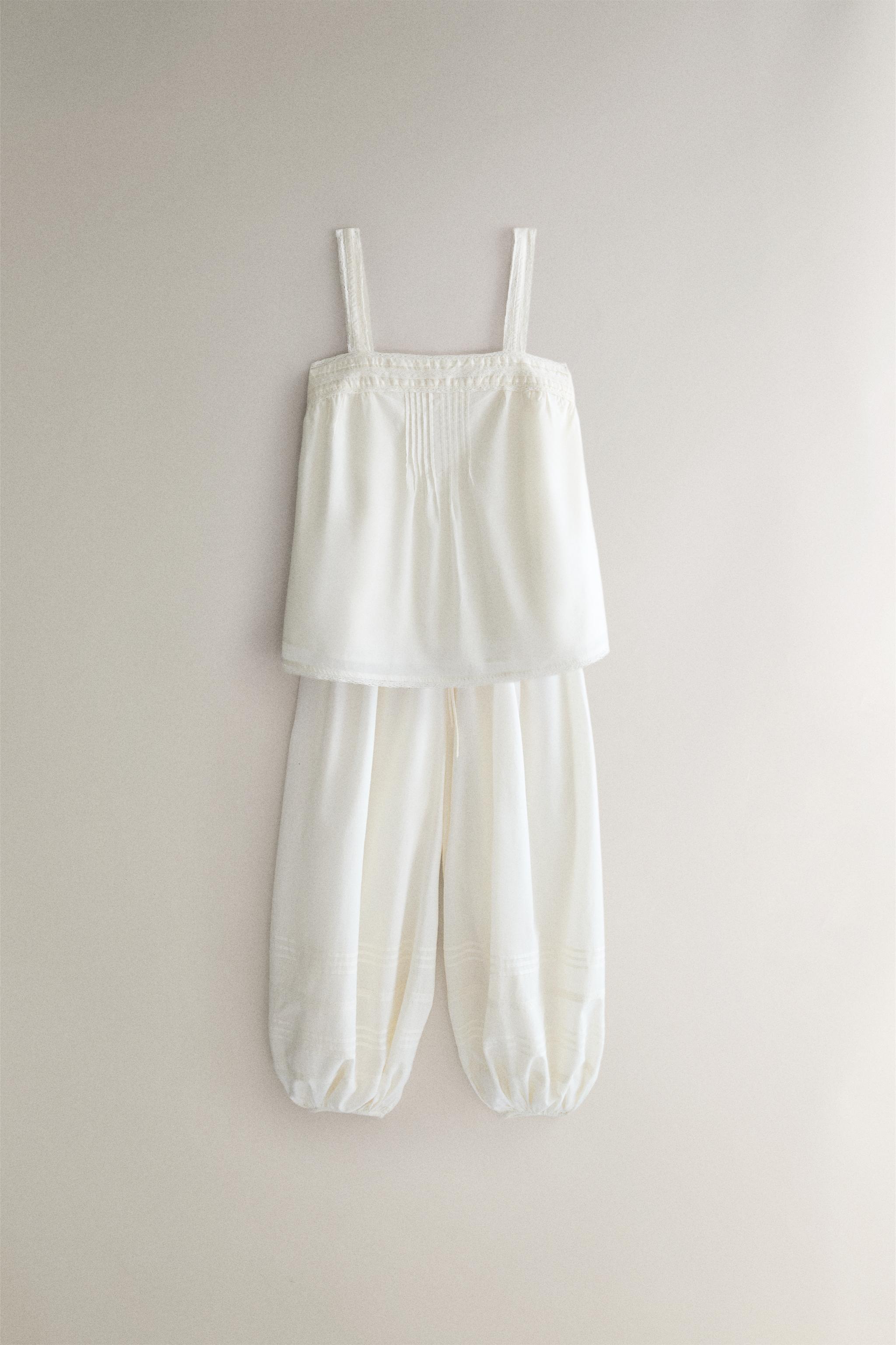 SMOCKED TROUSERS WITH LACE AND DRAWSTRINGS