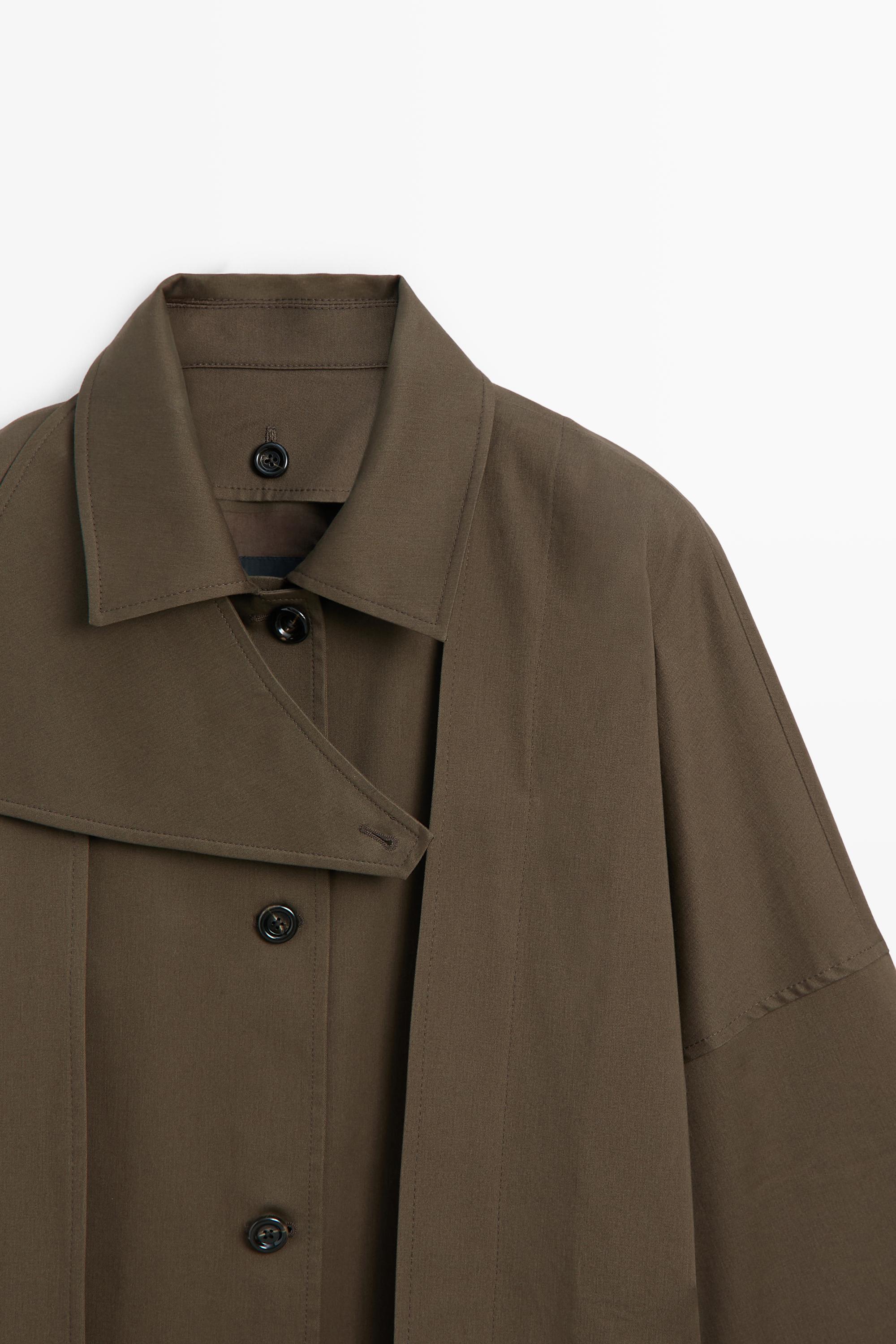 Trench en coton mélangé avec détail split