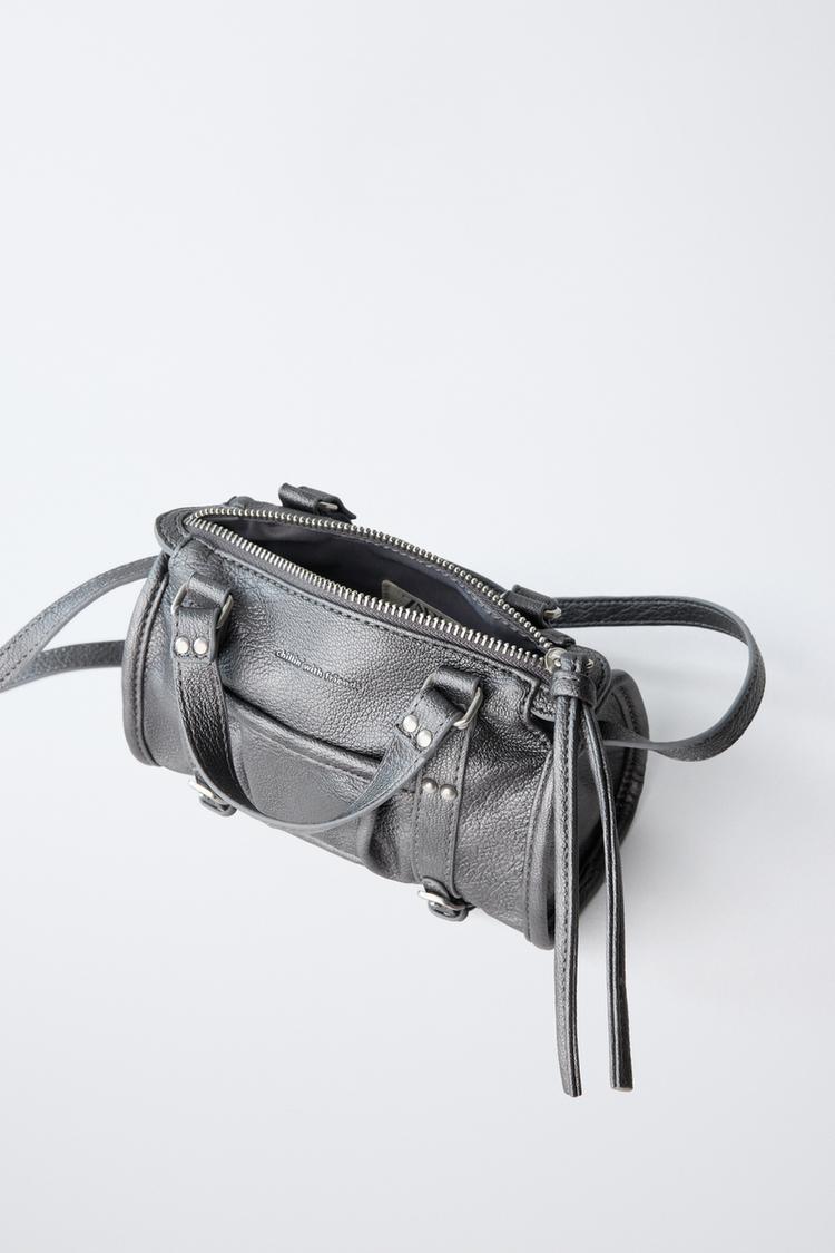 BOLSO CRUZADO CON TACHAS 4