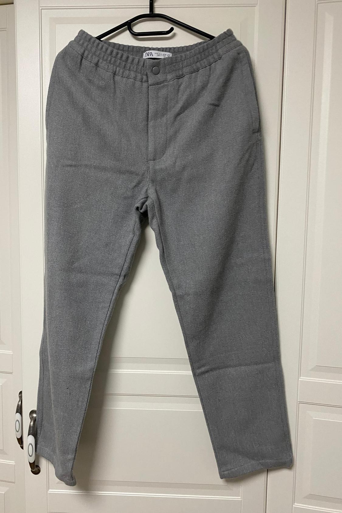 RELAXED FIT HERRINGBONE TROUSERS