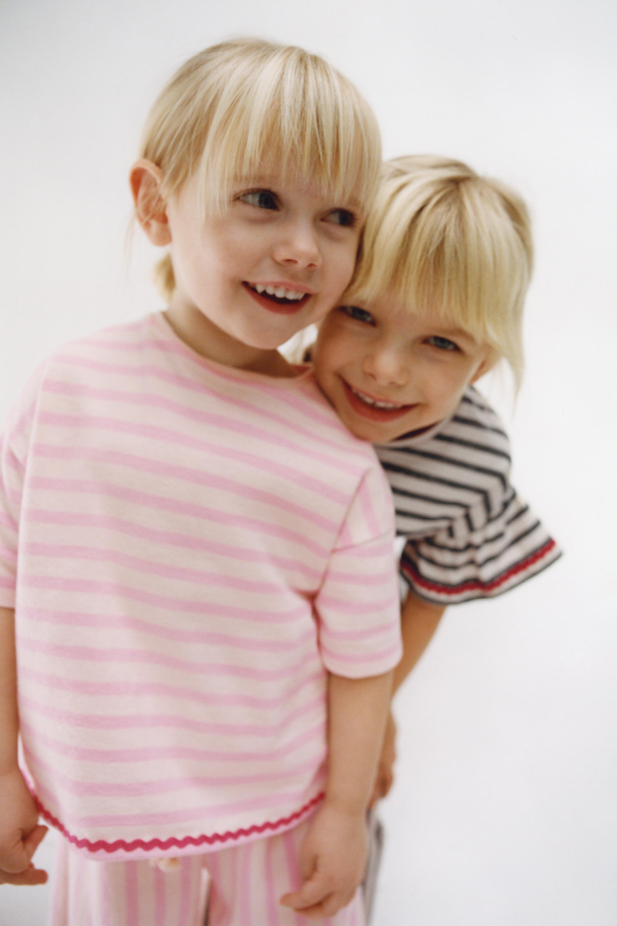 WOVEN STRIPED T-SHIRT WITH RUFFLE TRIM — Pink