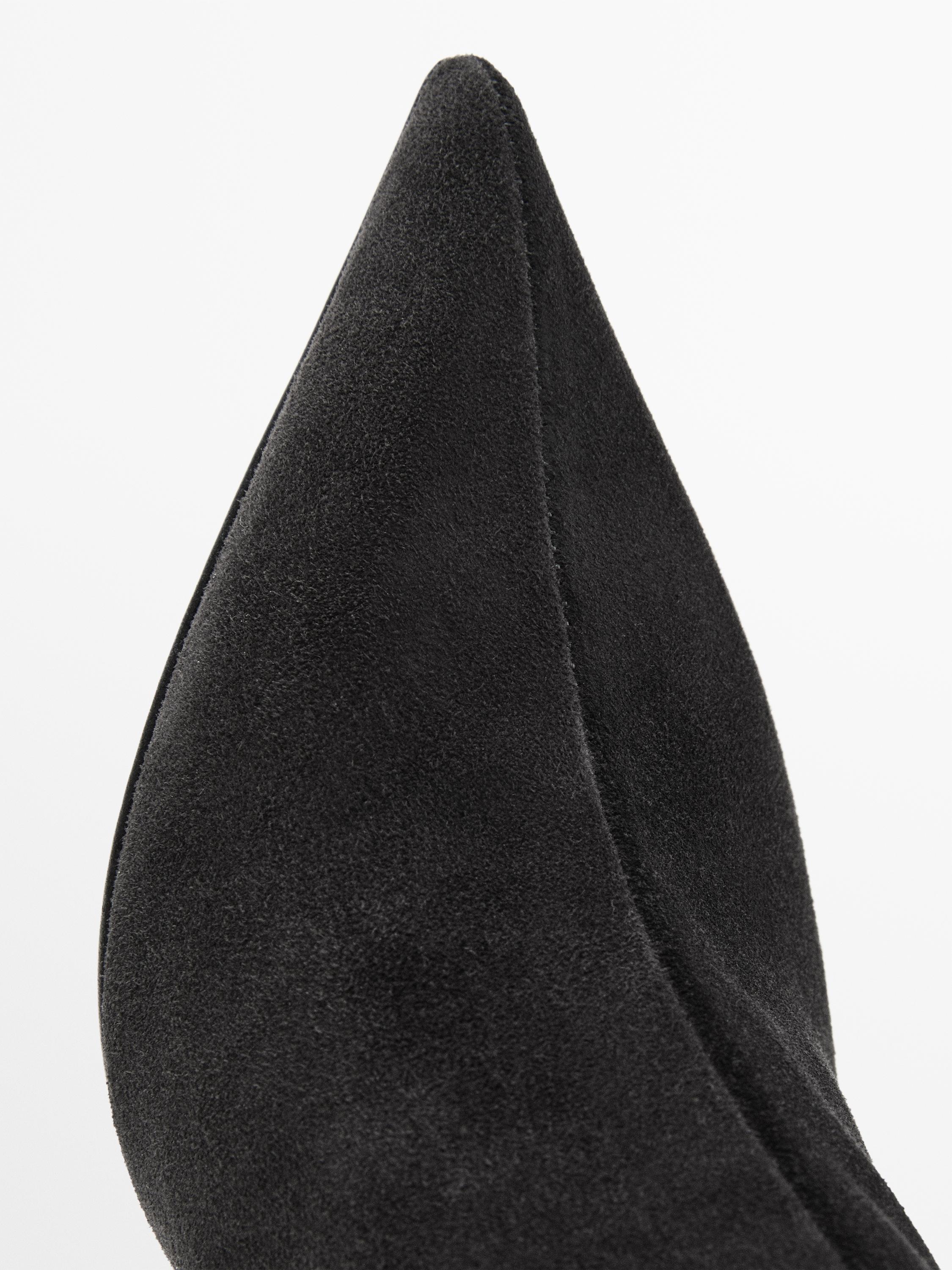 Bottines à talon en croûte de cuir